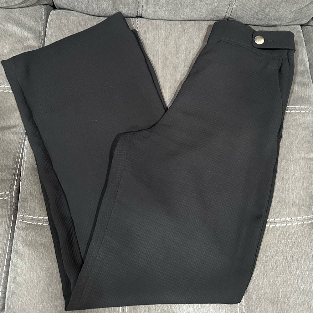 Black textured high waisted wide leg pants with pockets